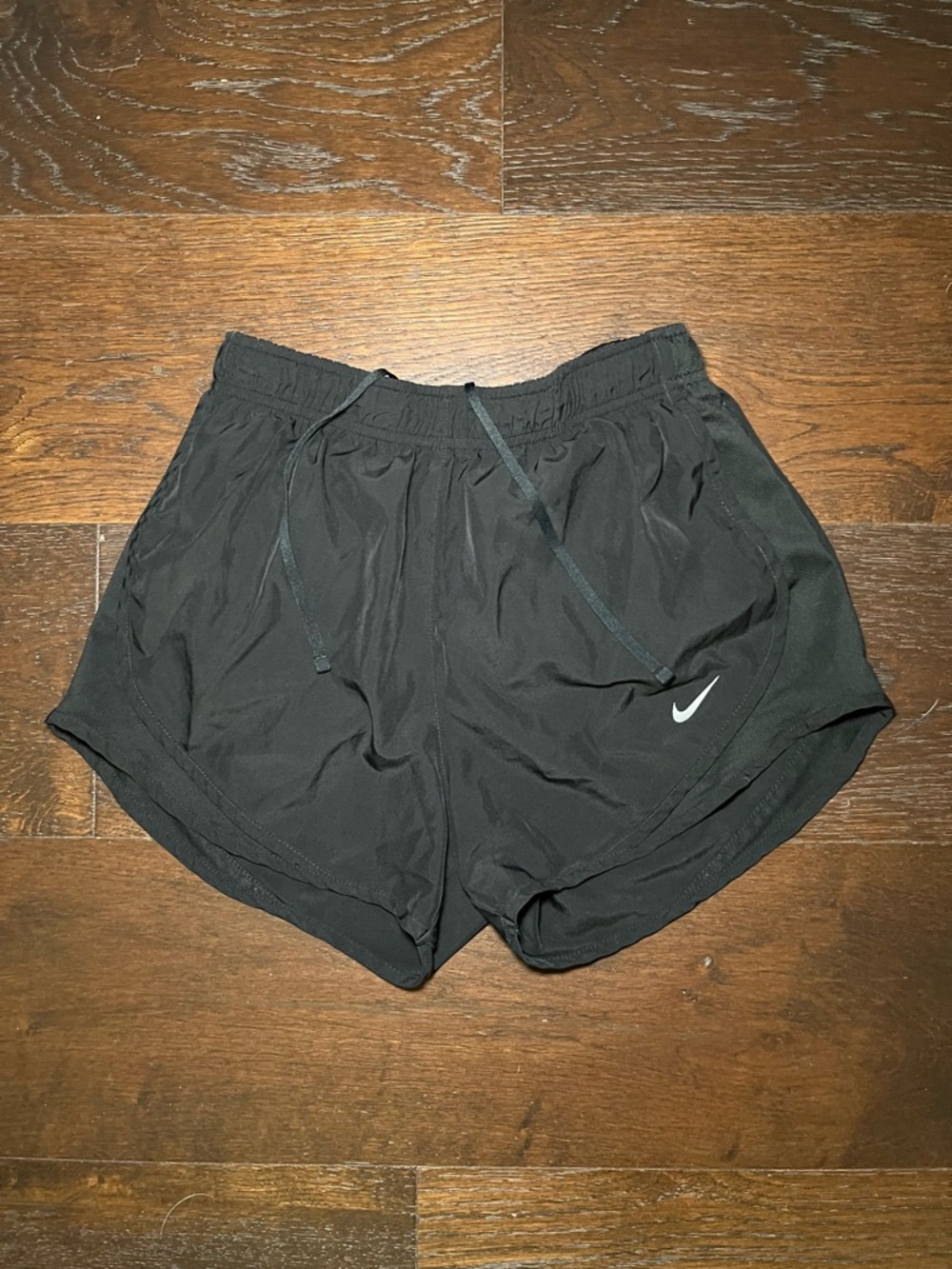 Nike Women's Black Athletic Shorts with White Swoosh Accent